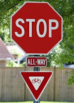 idaho stop sign allowing bicycles to yield